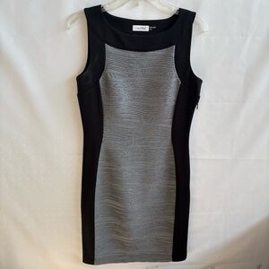 Calvin Klein Black and Gray sheath Dress Size 6. PTP 18”. Length 38” INV25/325